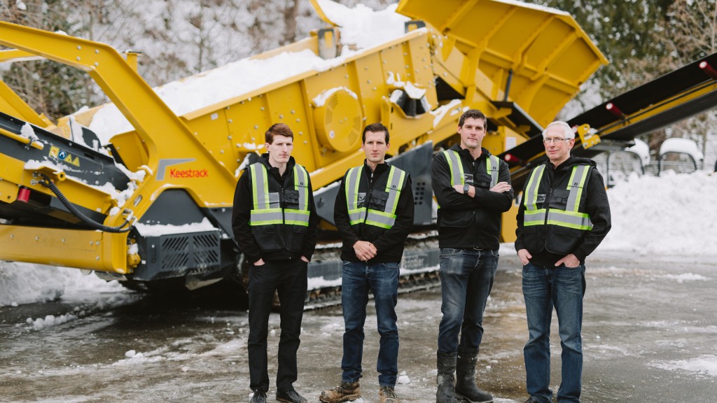 The Todd family – Loren, parts & service coordinator; Royden, vice president of operations; Daryl, president; and Steve, general manager – with a Keestrack K6 Frontier Screener.