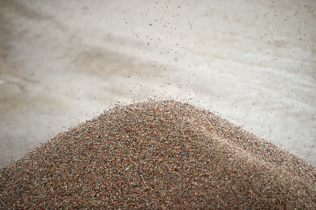 Recovered clean aggregate suitable for reuse in construction.