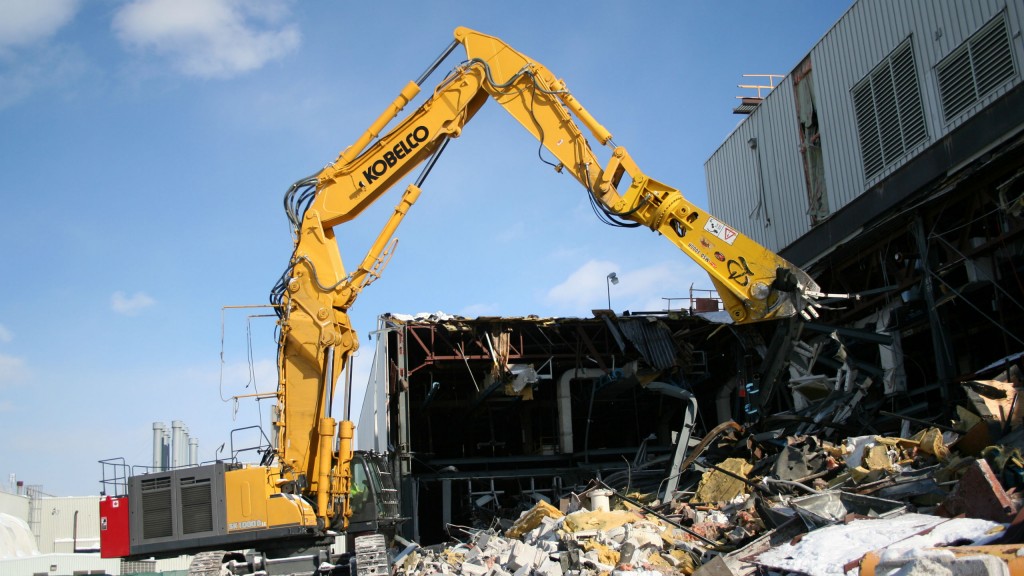 KOBELCO debuts demolition excavator and car demolisher