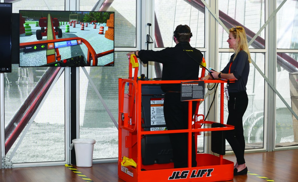 CONEXPO show attendee tests out JLG’s Training Simulator.