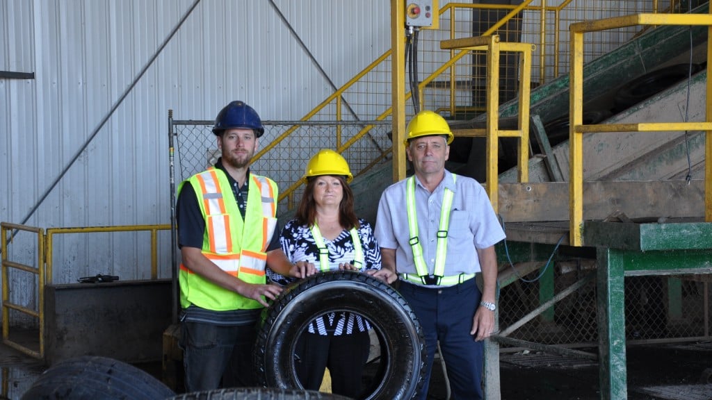 Halifax C&D Recycling vice-president Mike Chassie with his parents, company founders Lee-Anne and Dan Chassie, at the company’s tire recycling facility.