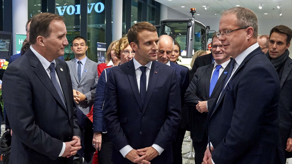 From left: Swedish Prime Minister Stefan Löfven, French President Emmanuel Macron and Martin Lundstedt, President and CEO of the Volvo Group, at the Volvo Group headquarters in Gothenburg.
