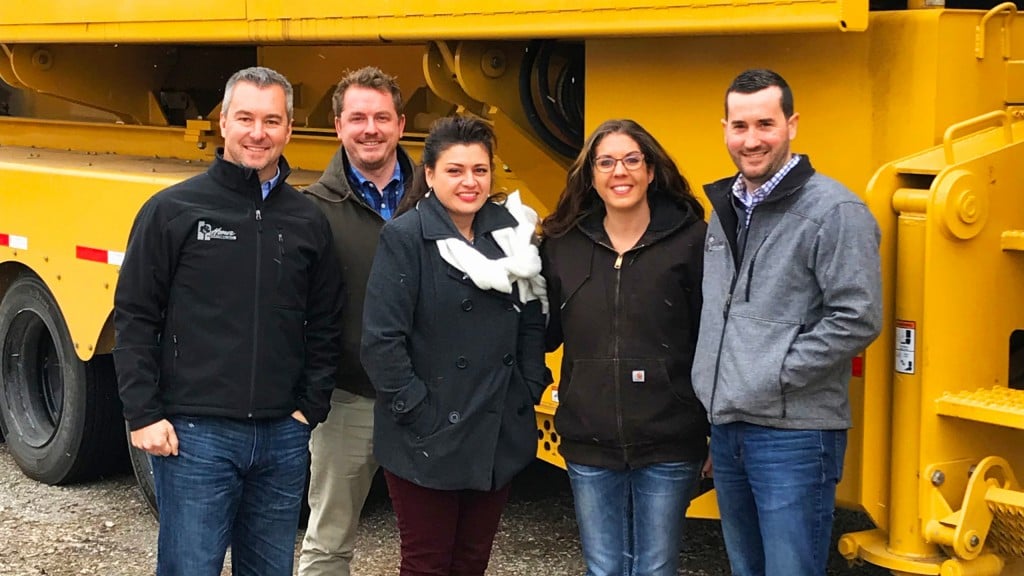 Part of the team at Homer Industries, with one of their TG9000 Vermeer tub grinders, from left: Todd Hahn, Chad Wallace, Kimberly Bell, Sam Elder and Josh Doherty.