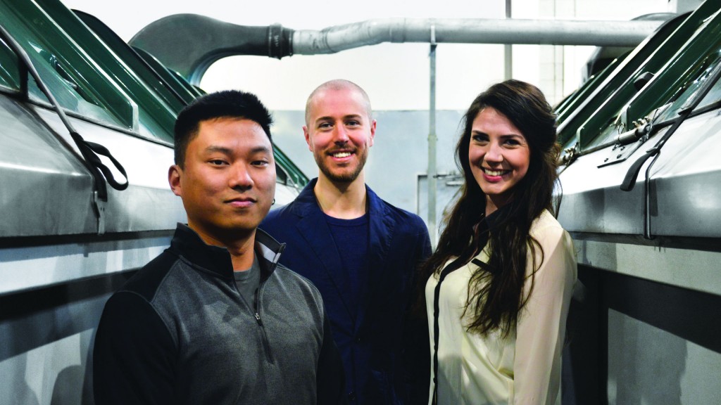 The Hop Compost executive team between two HotRot vessels. From left to right: Chris Wong, CTO; Kevin Davies, Founder & CEO; and Meghan Perry, CFO.