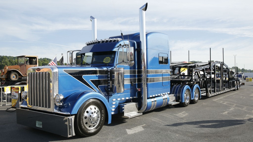 Eric Turner, Sr.'s 2015 Peterbilt 389 with a 2018 Wally-Mo 8 car hauler won Best in Show.