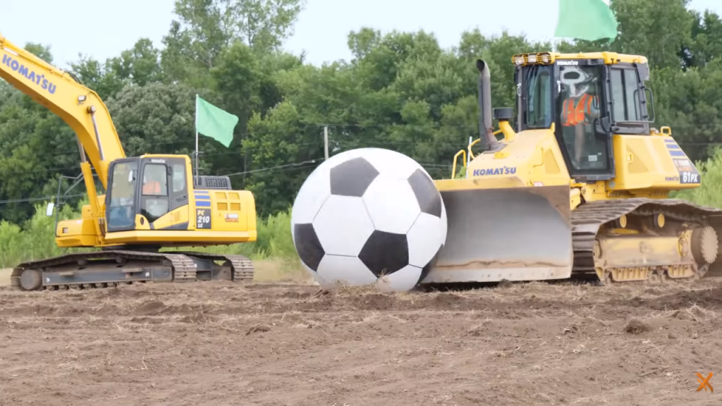 Watch this: Extreme Sandbox takes Komatsu equipment to the pitch for game of extreme soccer