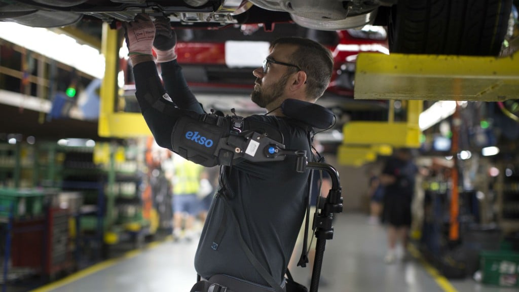 The EksoVest is helping take  strain off the overhead work that some Ford employees perform.