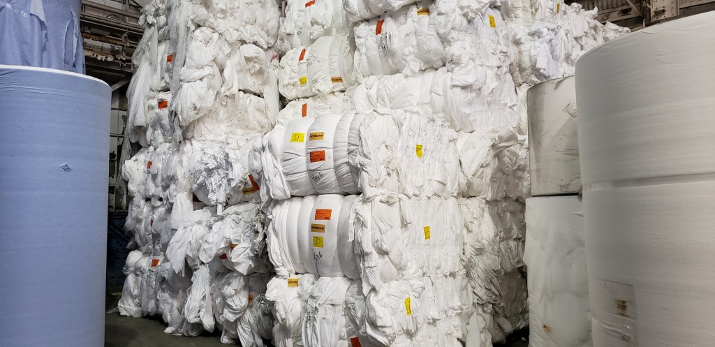 Baled nonwoven material ready for repurposing.
