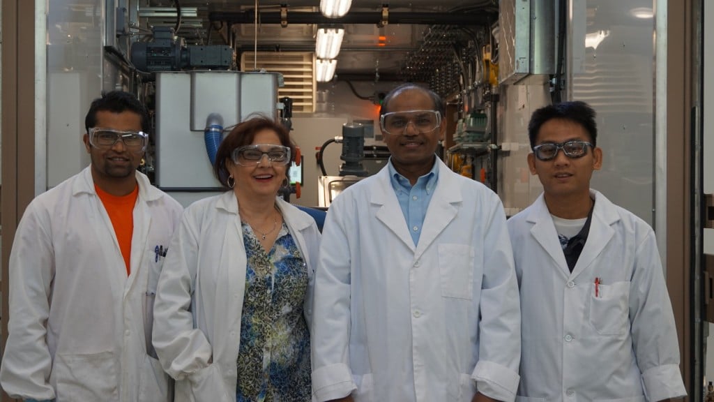 Ziba Hajizadeh, P.Eng. (2nd from left), recently promoted to VP, Engineering, with other Micron Waste R&D team members, including Co-Founder and Chief Technology Officer, Dr. Bob Bhushan (2nd from right) in front of a Cannavore unit.