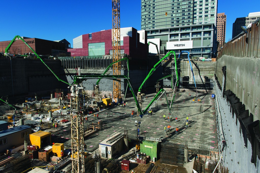 A new record for the largest continuous concrete pour was set in Washington state when 13,690 cubic yards (10,467m³) of concrete was placed in 24 hours for the foundation of the 450-foot (137.16m) tall north tower at Lincoln Square.