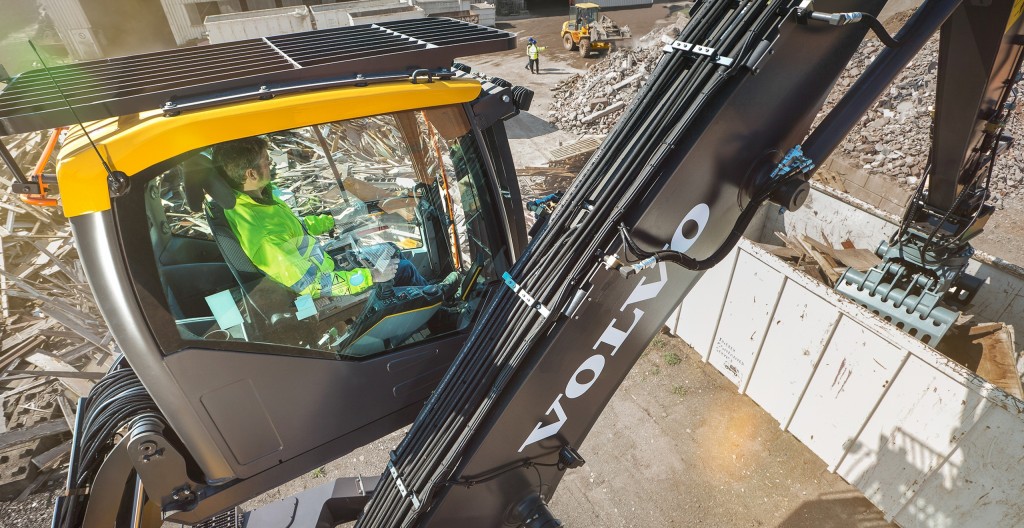 The Volvo EW240E's Hydraulically elevated cab raises 16 feet, and has double-damped cushioning to reduce noise and vibrations, as well as L8 multifunction joystick with Comfort Drive Control (CDC) and a Standard arm-in-limiter prevents grapples and material from contacting the cab.
