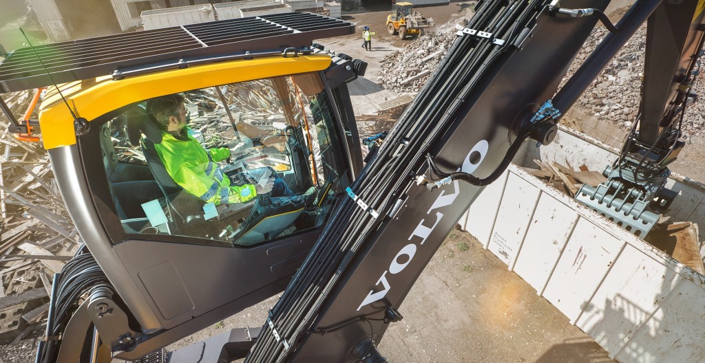 The Volvo EW240E's Hydraulically elevated cab raises 16 feet, and has double-damped cushioning to reduce noise and vibrations, as well as L8 multifunction joystick with Comfort Drive Control (CDC) and a Standard arm-in-limiter prevents grapples and material from contacting the cab.
