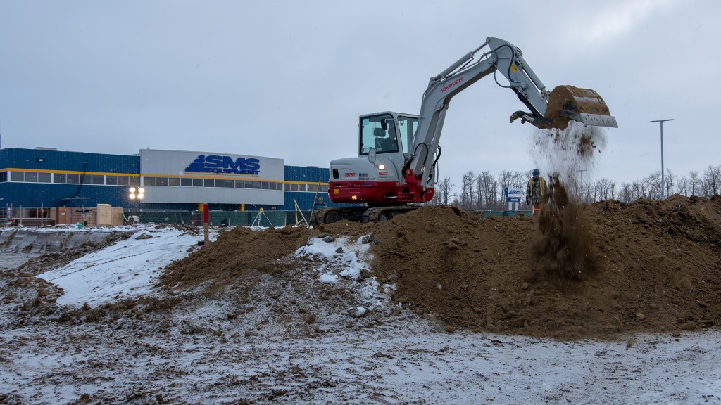 A Takeuchi TB260 at work on the expansion of SMS Equipment headquarters in Acheson, Alberta.