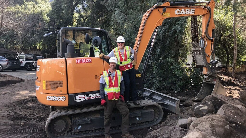 The operation cleared debris from the creek to alleviate ongoing flood risks and further damage to homes in the area. The CASE CX80C was the primary tool for clearing and removing debris.