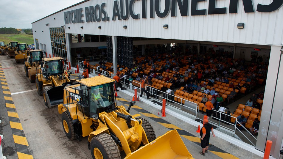 More than 430 loaders were sold in Ritchie Bros.' record-breaking Orlando, FL auction last week. (CNW Group/Ritchie Bros. Auctioneers).