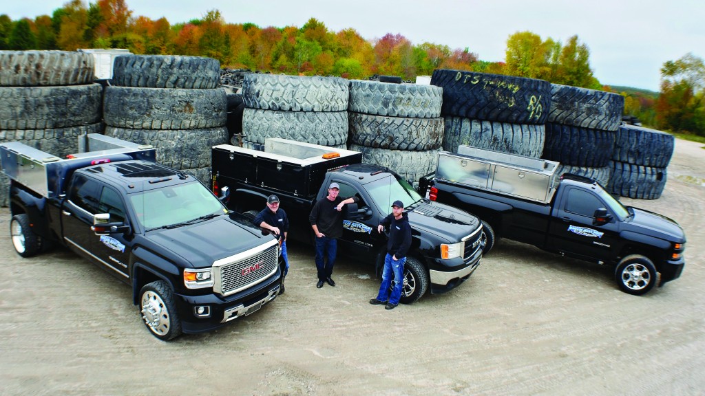 Keith Kitchen with his sons and their service trucks, equipped with VMAC UNDERHOOD70 Air Compressors.