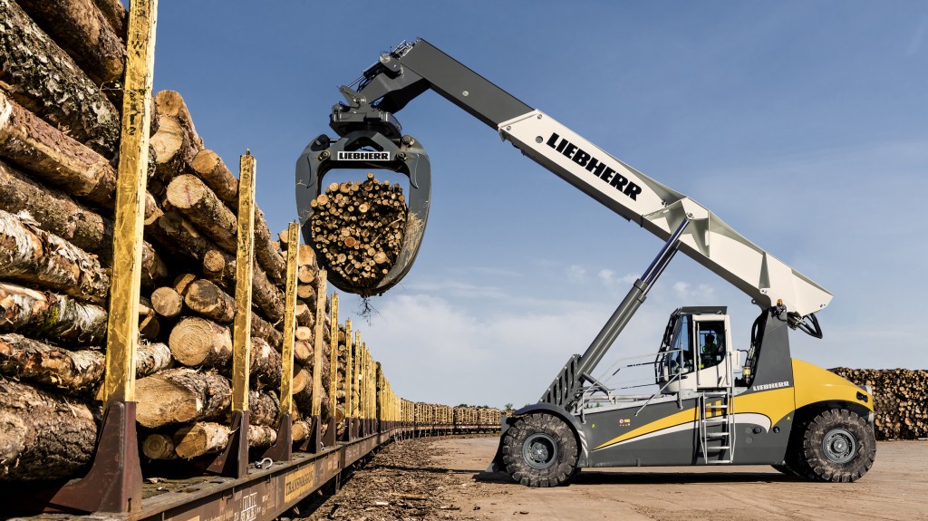 The LRS Log Handler handling timber on a sawmill site.