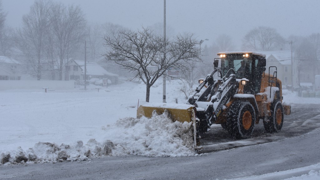 Steven Desmarais Construction uses a Hyundai HL955 wheel loader to clear a Milford, N.H., commercial parking lot during a late winter blizzard.