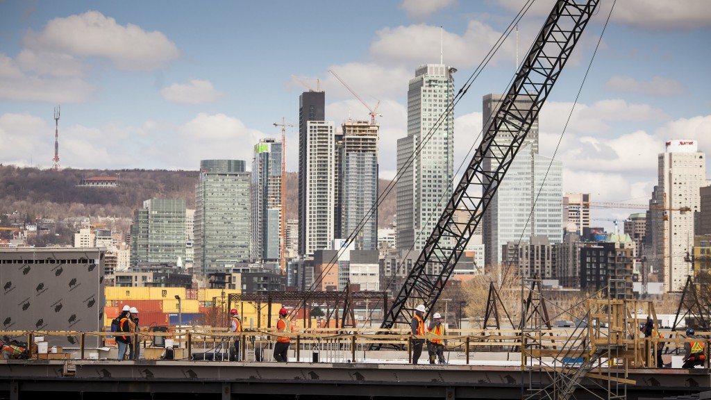 Men on a dock with a crane.