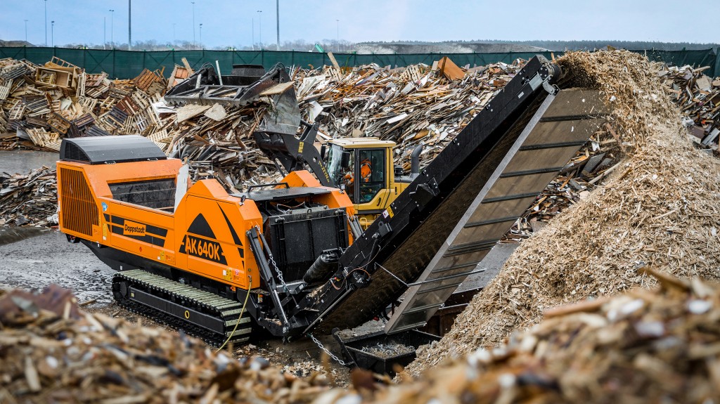 A shredder machine in operation on worksite