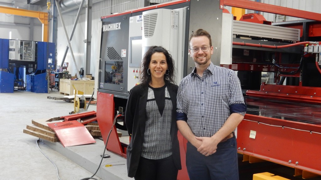 Machinex’ Karine Moreau, director of communications, and Jonathan Ménard, Eng., project director, on the factory floor with an optical sorter in production, in Plessisville, Quebec.