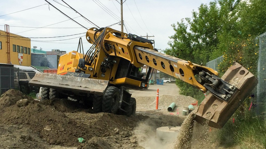 Excavator digging a trench