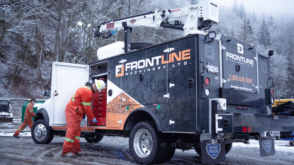 Men working on Frontline Machinery vehicle