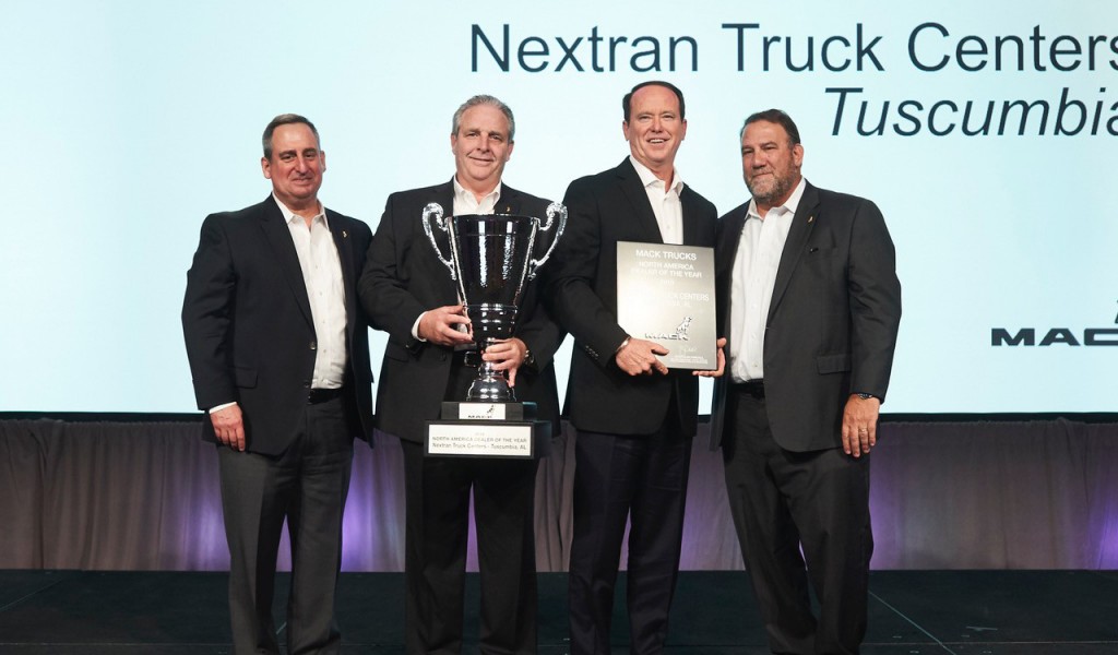 men from Nextran win Mack dealer of the year award