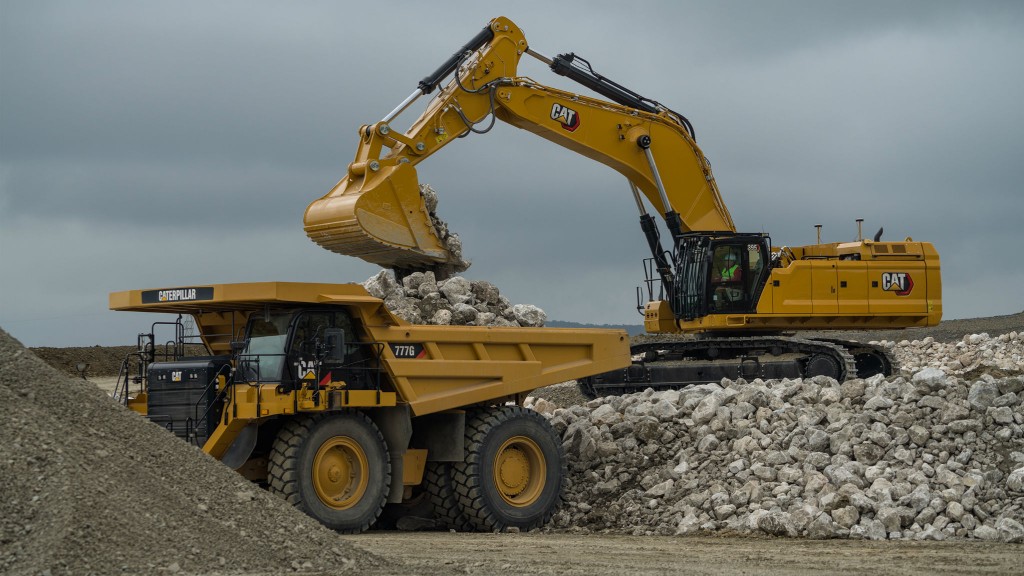 Cat hydraulic excavator loading an ADT