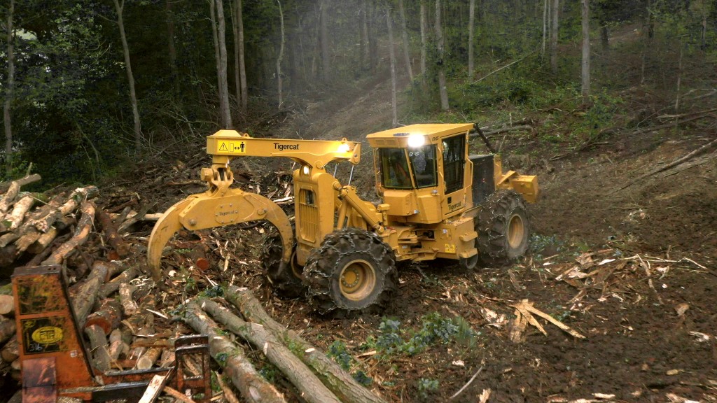 Tigercat 602 grapple skidder in operation in forest