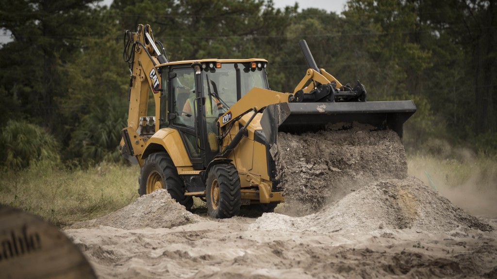 Cat 420 XE backhoe loader in action