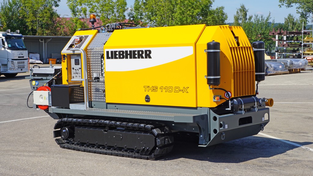 liebherr 110d k crawler concrete pump in a parking lot