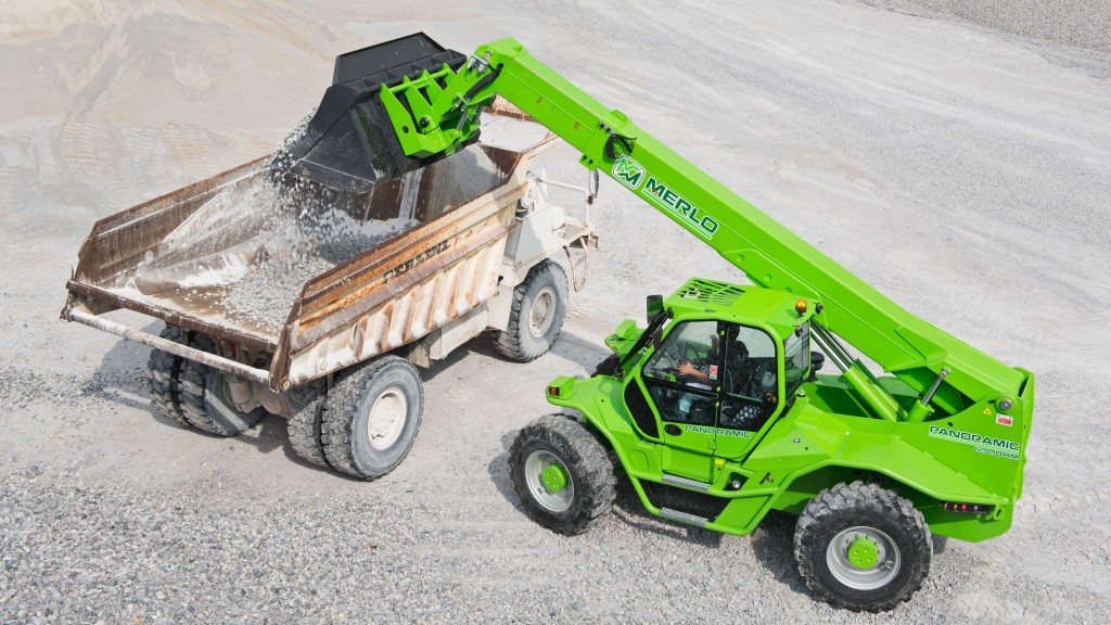 Merlo telehandler loads aggregate into a haul truck