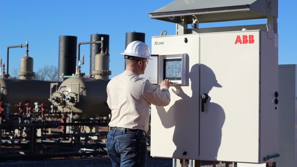 worker inputs information on a ABB controller worker inputs information on a ABB controller