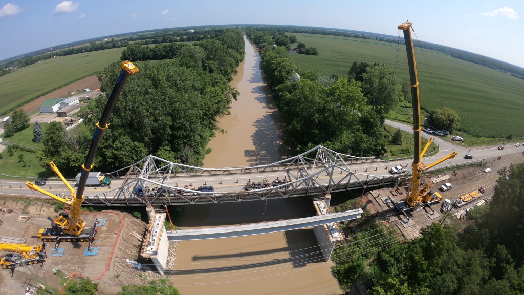 All-terrain cranes like these two on an Ontario bridge job could move more efficiently in Alberta thanks to an upcoming pilot project.