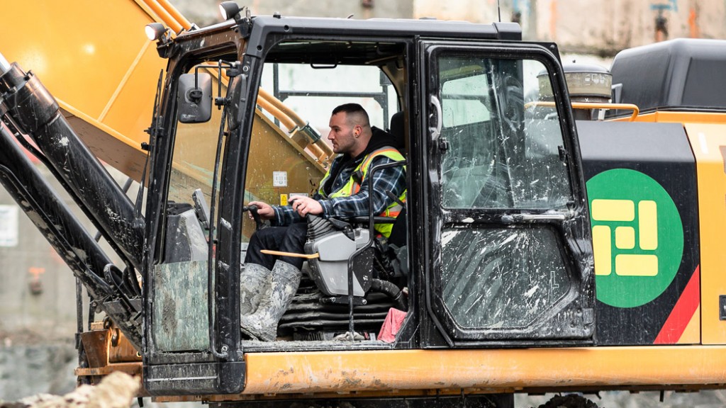 man operates a excavation machine