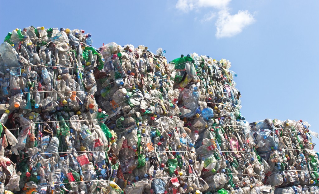 stacked piles of wrapped plastic recycled material