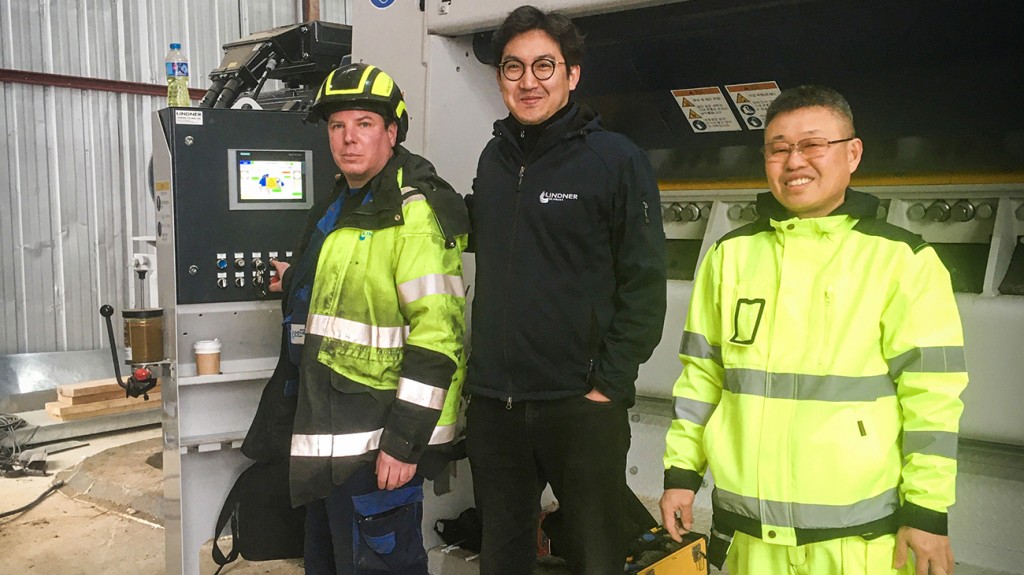 three Lindner Recycling workers pose at Singapore plant