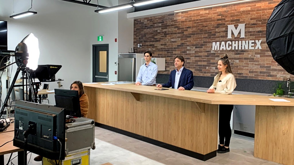 Pierre Paré, CEO of Machinex, surrounded by the masters of ceremony,Jean-Michel and Anne-Marie Paré