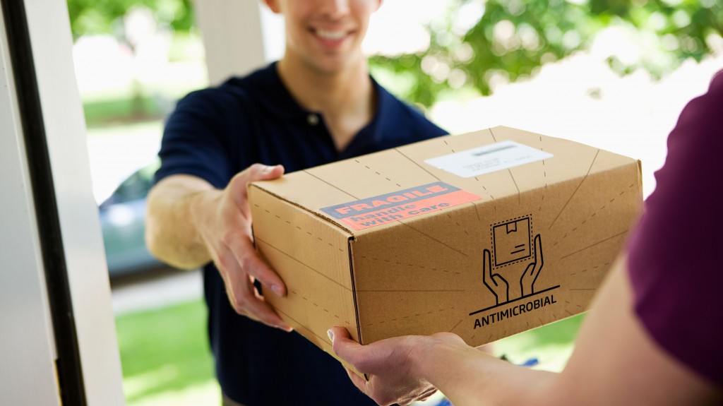 antimicrobial packaging being delivered to a house