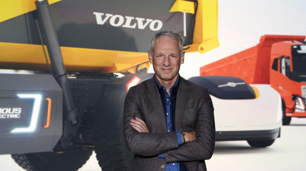 nils Jaeger, President of Volvo Autonomous Solutions, standing in front of a Volvo machine