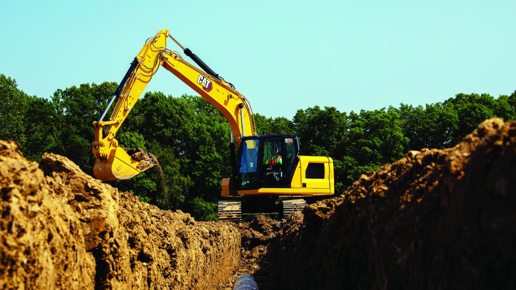 Caterpillar 317 Next Gen excavator above a trench