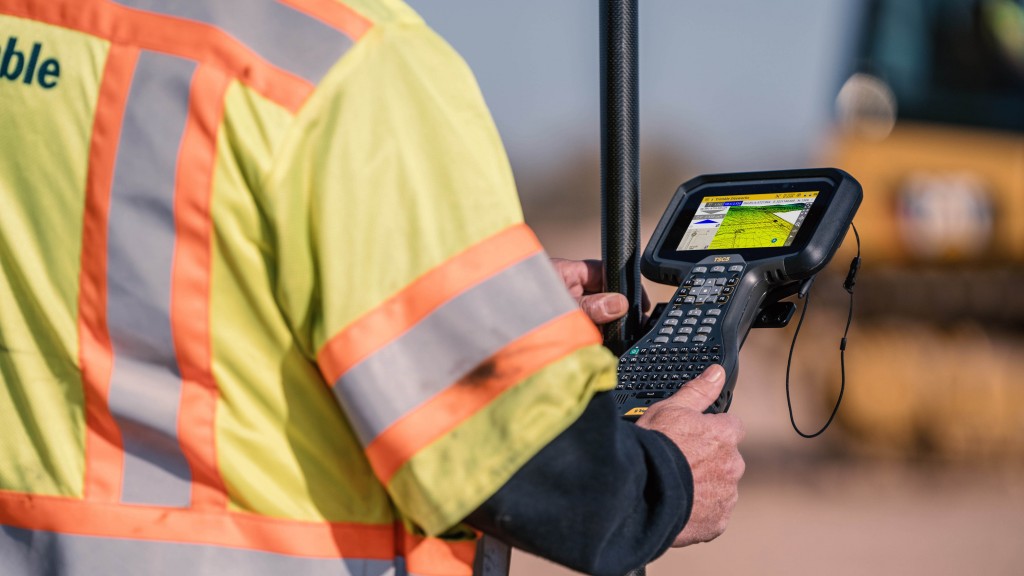 trimble siteworks software trimble tsc5 controller being used by a Trimble technician