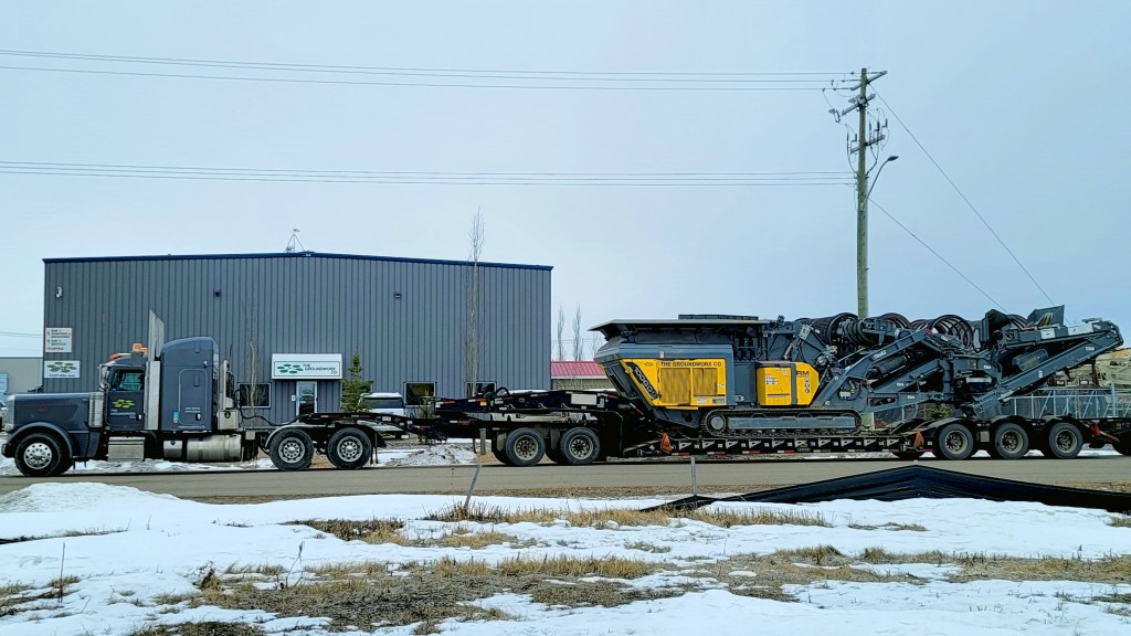 Rubble Master RM100 GO being pulled on a trailer