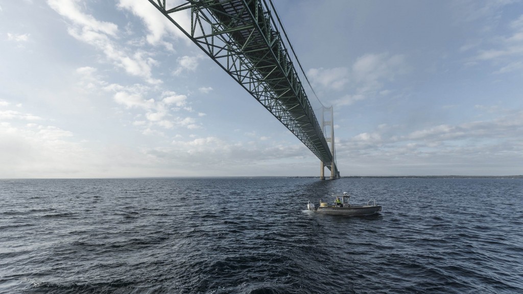 boat below bridge in sea boat below bridge in sea
