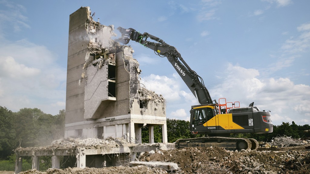 Volvo CE EC380E straight boom demolition excavator tears down building