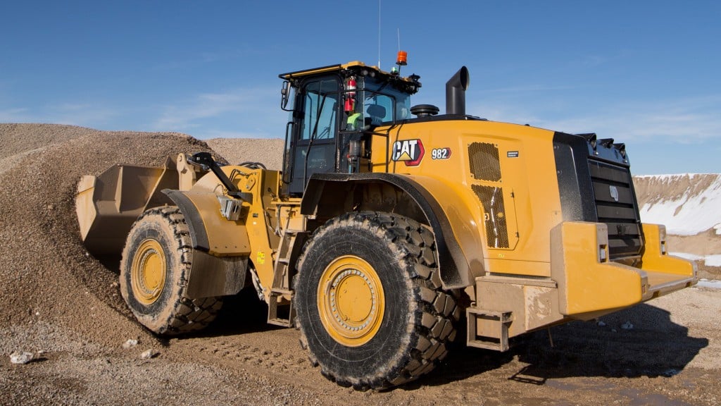 Cat 982 digging in pile