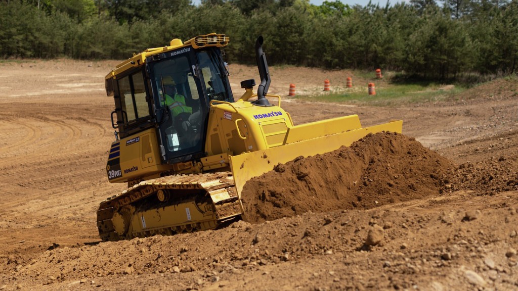 komatsu d39i-24 dozer moving dirt