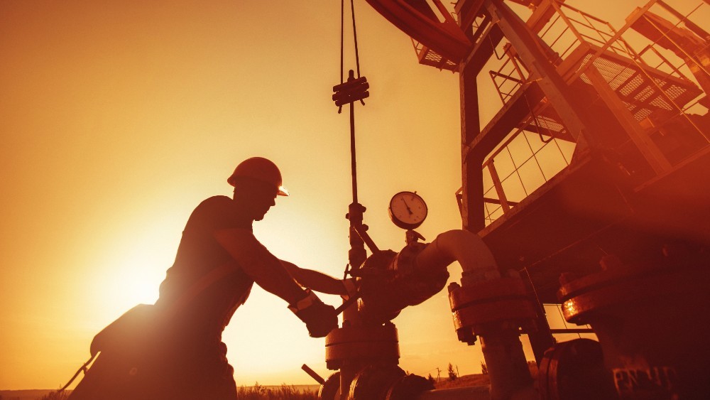 man operating a oil rig man operating a oil rig