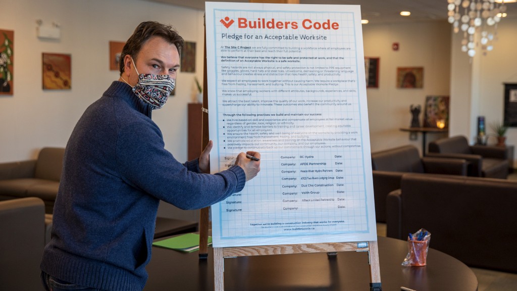 Chris Waite of BC Hydro signs the new Builders Code